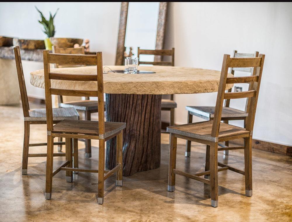 ARKA Living In and out limestone table on tree trunk