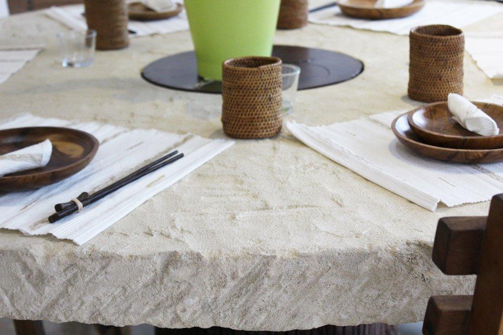ARKA Living In and out limestone table on tree trunk