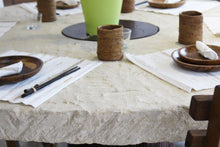 Load image into Gallery viewer, ARKA Living In and out limestone table on tree trunk
