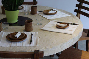 ARKA Living In and out limestone table on tree trunk