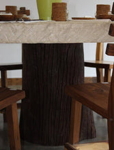 Load image into Gallery viewer, ARKA Living In and out limestone table on tree trunk
