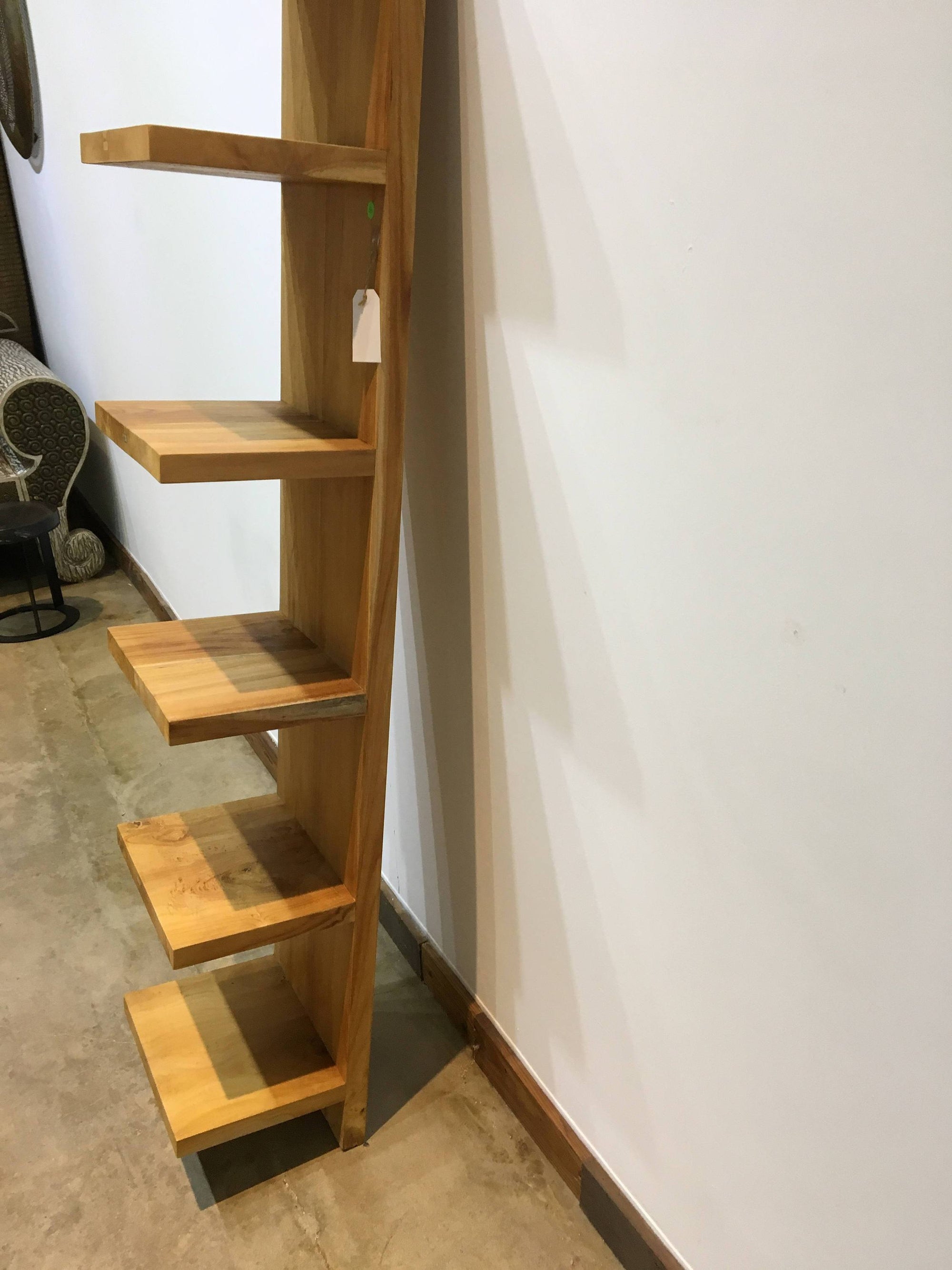 ARKA Living Modern primitive leaning bookshelf