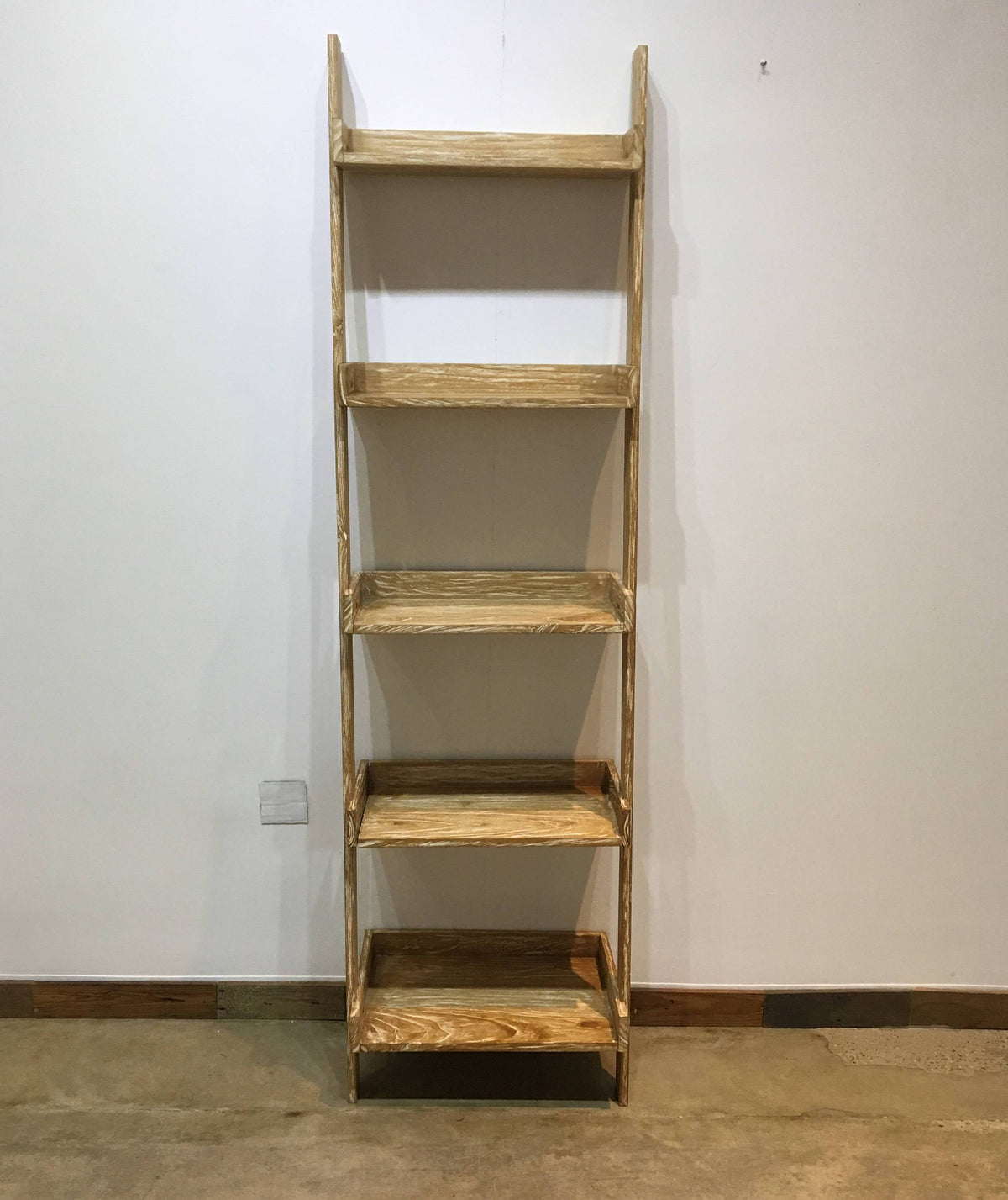 Modern primitive leaning shelf