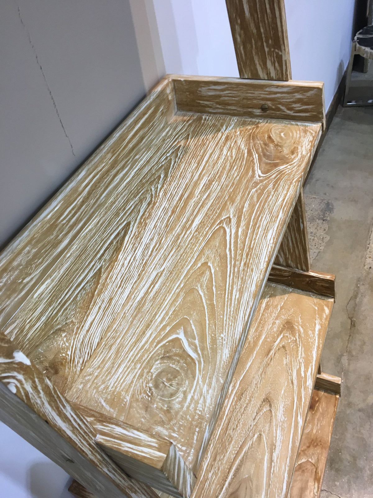 Modern primitive leaning shelf