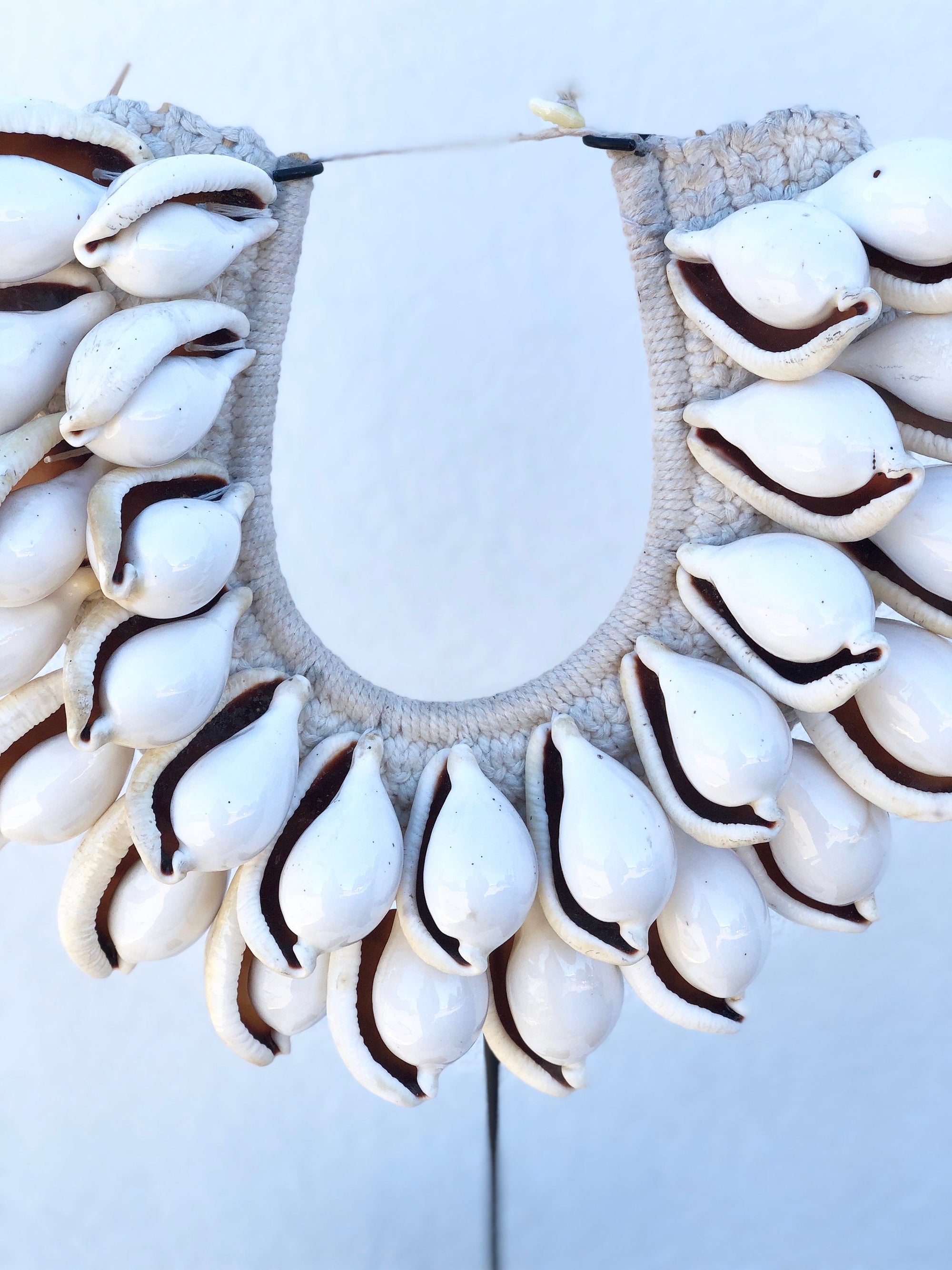 Large Atlantis Ovula Tribal Shell Necklace on Metal Stand