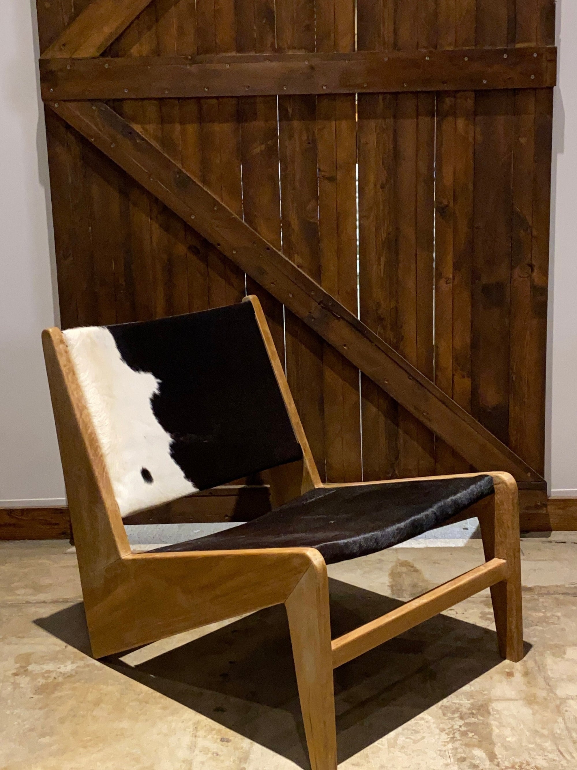 Two (2) Black and white cowhide leather living room chair - Leather and Teak Wood frame Chair | Simple Unique Dining Chair